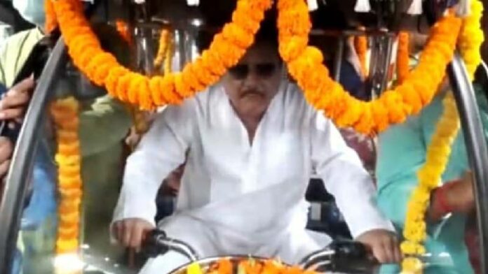 Madan Mitra 21 se July breaking Corona regulations